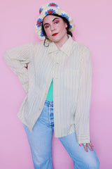 Women's or men's vintage 1960's Hickok label long sleeve light lime green button up pajama shirt with vertical stripes and one left chest pocket.