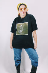 Women's or men's vintage 1997 Gildan Heavyweight, Made in Canada label short sleeve black The Kinks' Ray Davies The Storyteller tour tee with colored graphic and text on front and back.