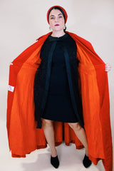 Women's vintage 1950's/60's Count Romi LTD., Your All Weather Traveler label long sleeve long length bright red velvet duster coat. One closure at waist.