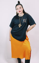 Men's or women's vintage 1990's Murina, Made in USA label short sleeve black Metallica band tee with multicolored graphic on front and back.