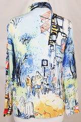 Women's vintage 1980's Michael Leu label long sleeve button up blouse with small collar, white buttons, and all over novelty print in a silk material.