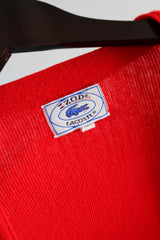 Women's or men's vintage 1980's Izod Lacoste label long sleeve bright red colored button up cardigan sweater with small alligator patch on left chest.