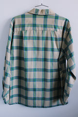 Men's vintage 1970's Towncraft, Penneys label long sleeve button up plaid shirt in tan color with blue and green plaid print. Chest pockets.