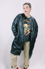 Women's vintage 1970's Dan Di Modes label mod style black leather jacket with leather buttons and pockets.