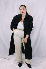 Women's vintage 1990's Nordstrom - Point of View label long sleeve long length black trench coat in a wool material. Fully lined, side pockets, back slit, and shoulder pads.