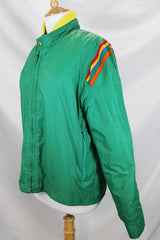 Women's or men's vintage 1980's Pacific Trail Sportswear label long sleeve green zip up nylon puffer jacket with yellow and rainbow colored trim.