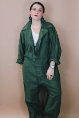 Men's vintage 1980's Men's Coveralls Type 1 label size XL long sleeve army green one piece jumpsuit with button closure and pockets in cotton material.