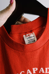 Women's or men's vintage 1970's Sport-T by Stedman label short sleeve red tee with white and black graphic on front and back in a polyester and cotton material.