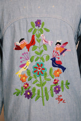 Men's or women's vintage 1970's Lepe, Puerto Vallarta, Mexico label long sleeve light blue denim wash chambray button up shirt with colored embroidery in the front and back.