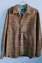 Men's vintage1960's Sierra Wools, Single Needle Tailoring, Made in Japan label long sleeve XL button up shirt with collar in an orange and brown plaid print and wool material.