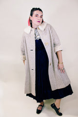 Women's vintage 1960's Mademoiselle Vogues, Fashions in Good Taste 3/4 arm length knee length coat in a wool cream color and cream fur trim on neckline and cuffs.