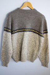 Women's or men's vintage 1990's Lobo by Pendleton label long sleeve pullover wool sweater in dark and light grey colors with navy and yellow print pattern across chest.