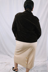 Men's or women's vintage 1970's long sleeve short length chocolate brown jacket in a fuzzy soft suede material. Gold hardware, zipper up the front, contrast stitching, and dagger collar.