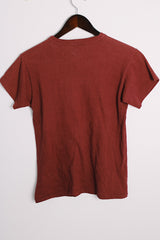 Women's or men's vintage 1970's short sleeve maroon colored tee with a white graphic on the front in a cotton and polyester material.