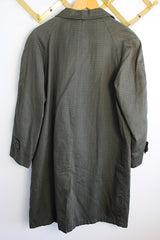 Men's or women's vintage 1960's Brent Prep Sold Exclusively by Montgomery Ward long sleeve long length cotton material lightweight trench coat in a dark green and all over subtle plaid print.