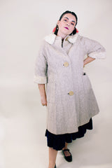 Women's vintage 1960's Mademoiselle Vogues, Fashions in Good Taste 3/4 arm length knee length coat in a wool cream color and cream fur trim on neckline and cuffs.