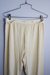 Men's or women's vintage 1950's cream colored wool material military long john underwear. Ribbed ankles and elastic waistband.