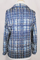 Women's vintage 1970's Mr. Alex, a division of Alex Colman Inc. label long sleeve button up blouse with dagger collar in all over white and blue colored abstract print.