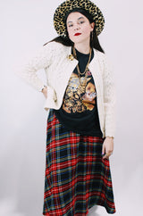 Women's vintage 1970's long sleeve cream colored button up acrylic sweater with scalloped edges on hem and cuffs.