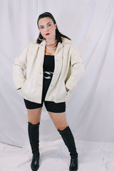Women's vintage 1960's Custom Made Genuine Native Deerskin label long sleeve cream colored leather jacket. Fully lined, side pockets, and leather covered buttons.