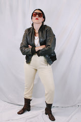 Men's or women's vintage 1950's Genuine Horsehides All Weather Garment, San Francisco, California label long sleeve brown leather bomber jacket with ribbed knit trim and quilted liner.