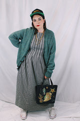 Women's or men's vintage 1970's Alps, Rugged Outdoors, Merrimac Valley, New England label long sleeve green colored button up cardigan.