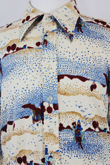 Men's or women's vintage 1970's Christopher Rand long sleeve cream colored polyester material button up shirt with all over farm print.