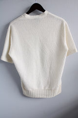 Women's or men's vintage 1970's Joel, Cal Made label short sleeve white top with a V shaped neckline and a chest pocket in textured acrylic material.