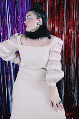 Women's vintage 1980's Made in USA label long sleeve mini length light tan colored dress.