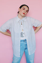 Men's or women's vintage 1970's Towncraft, Penneys label short sleeve white button up shirt with pink, yellow, and grey thin vertical stripes and one left chest pocket.