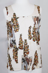 Women's vintage 1970's matching novelty print sleeveless tank top and button up blouse with dagger collar. All over novelty print in white and brown colors.