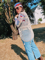 sleeveless cream crochet vest with beaded trim details vintage 1970's