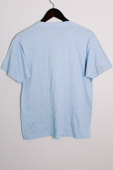 Women's or men's vintage 1970's Screen Stars, Made in USA label short sleeve light blue tee with a white graphic on the front in a polyester and cotton material.