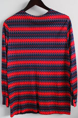 Women's vintage 1970's long sleeve red and navy colored striped zig zag top with half button front closure in a slinky polyester material.
