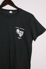 Women's or men's vintage 1970's Made in USA label short sleeve black colored Jethro Tull tour tee with graphic on front and back in white in cotton material.