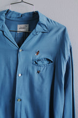 Men's vintage 1960's Penney's Towncraft label long sleeve blue button up shirt with one left chest pocket. Small embroidered golf clubs on chest.