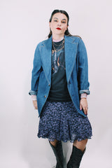 Men's or women's vintage 1970's Lee label long sleeve light wash denim blazer with two button closure, double lapel, and front pockets.