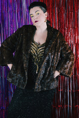 Women's vintage 1960's Fur Salon, M & T label long sleeve dark brown real fur evening jacket. No front closure, two side pockets and fully lined.