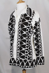 Women's vintage 1970's Brookvalley by Fairfield label long sleeve button up blouse in white with an all over abstract brown colored print.