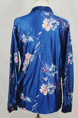 Men's or women's vintage 1970's Montgomery Ward label shiny vibrant navy blue button up shirt with dagger collar and all over floral print.