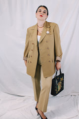 Men's or women's vintage 1970's Sax Overseas, Specially Made For Mr. R. E. Bankhead long sleeve beige colored double breasted blazer with thin pin stripes throughout.