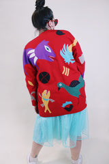 Women's vintage 1980's Mr. Girasol, Made in Mexico label long sleeve open front lightweight jacket in red with all over multicolored animals.