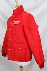 Women's or men's vintage 1980's Horizon Sportswear Inc., Made in USA label long sleeve red nylon puffer jacket with patch on left chest.