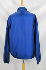 Men's or women's vintage 1980's Swingster Wearables, Made in USA label long sleeve zip up windbreaker in navy color and nylon material.