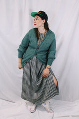 Women's or men's vintage 1970's Alps, Rugged Outdoors, Merrimac Valley, New England label long sleeve green colored button up cardigan.
