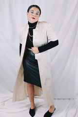 Women's vintage 1990's R & M Richards by Karen Wong label short sleeve long length duster dress in a cream satin like material. Long side slits, mandarin collar, and fabric covered buttons.
