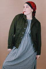 Men's vintage 1950's Caleb V. Smith & S, New York label size large dark green wool cropped fit long sleeve button up jacket with brown shearling liner.