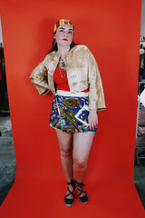 Women's vintage 1960's Dynasty Trade Mark label long sleeve cropped satin silk like robe jacket with all over print and fabric closures.