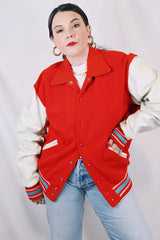Men's or women's vintage 1960's US Doe-Lon, The Finest Fashion in VINYL label long sleeve red and white varsity letterman jacket with snap buttons and pockets.