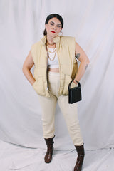 Women's or men's vintage 1970's A & M Industries, Seattle, Washington label sleeveless zip up puffer vest. Cream colored exterior, brown colored interior.